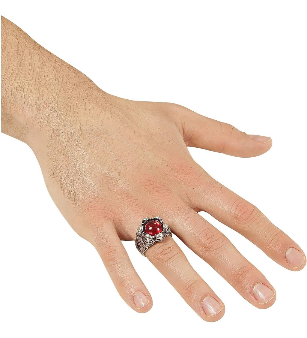 Prsten s lebkami a červeným drahokamem