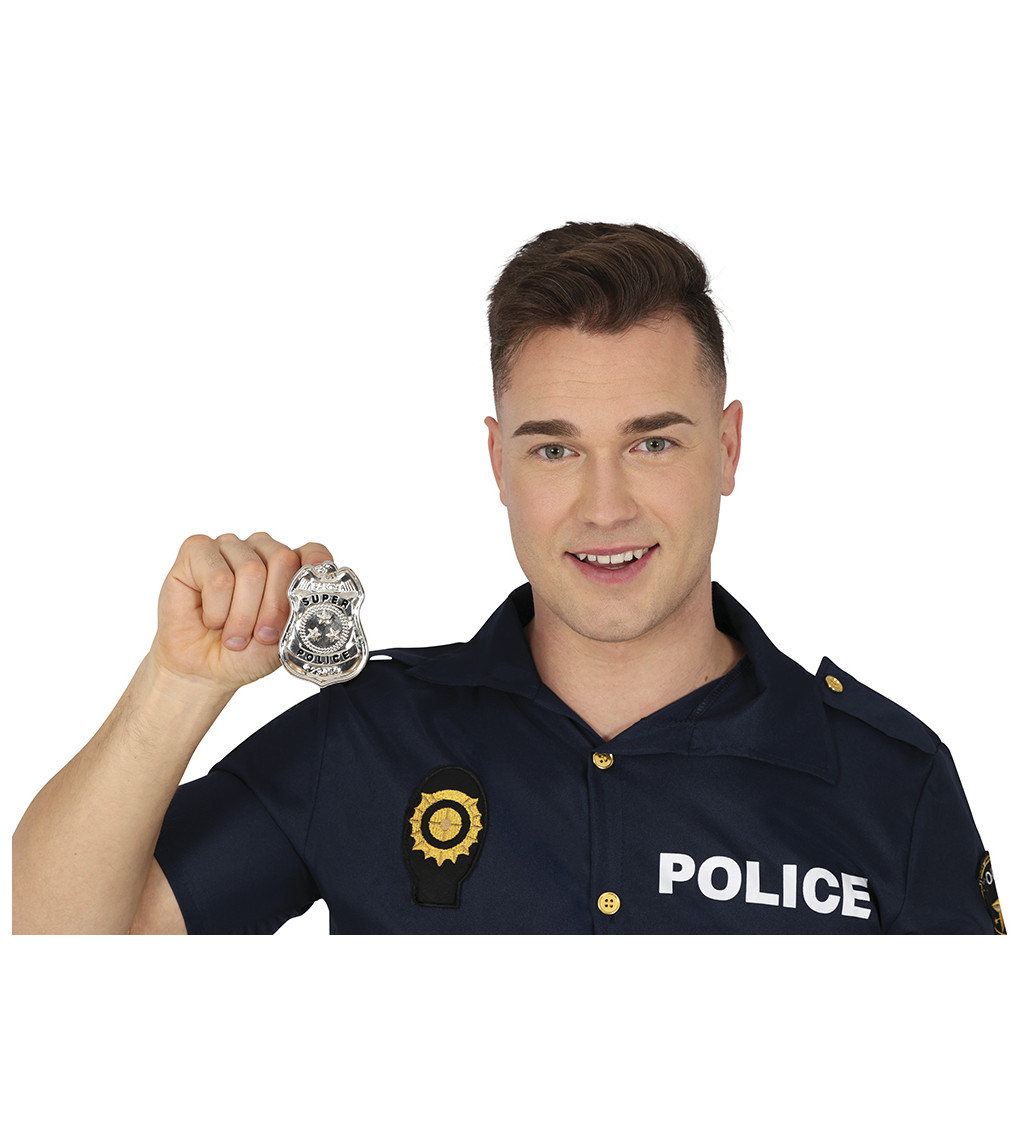 Kovový policejní odznak